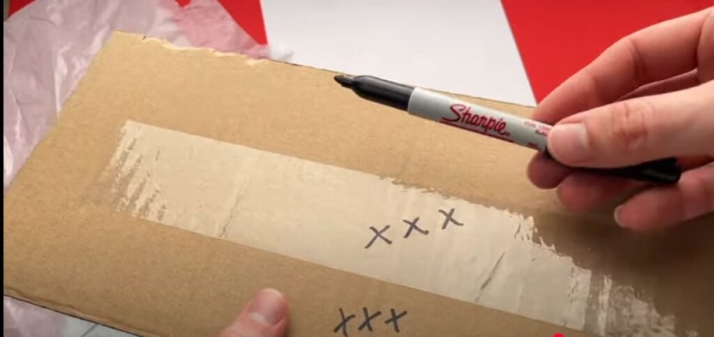 pen writes well-test on cardboard vs shiny tapes
